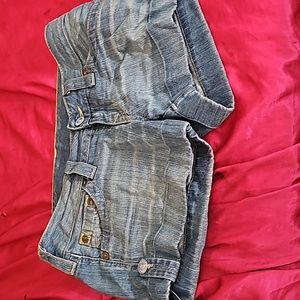 Only Warren once, true religion. Shorts with classic emblem on backpockets.